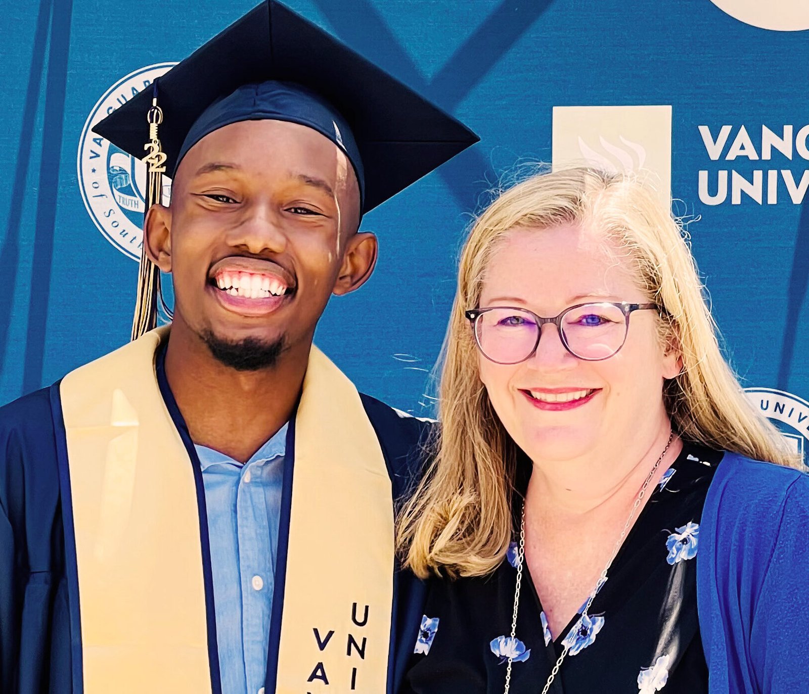 Dr. Stachowiak with a student at graduation