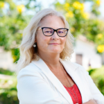 blond woman wearing glasses