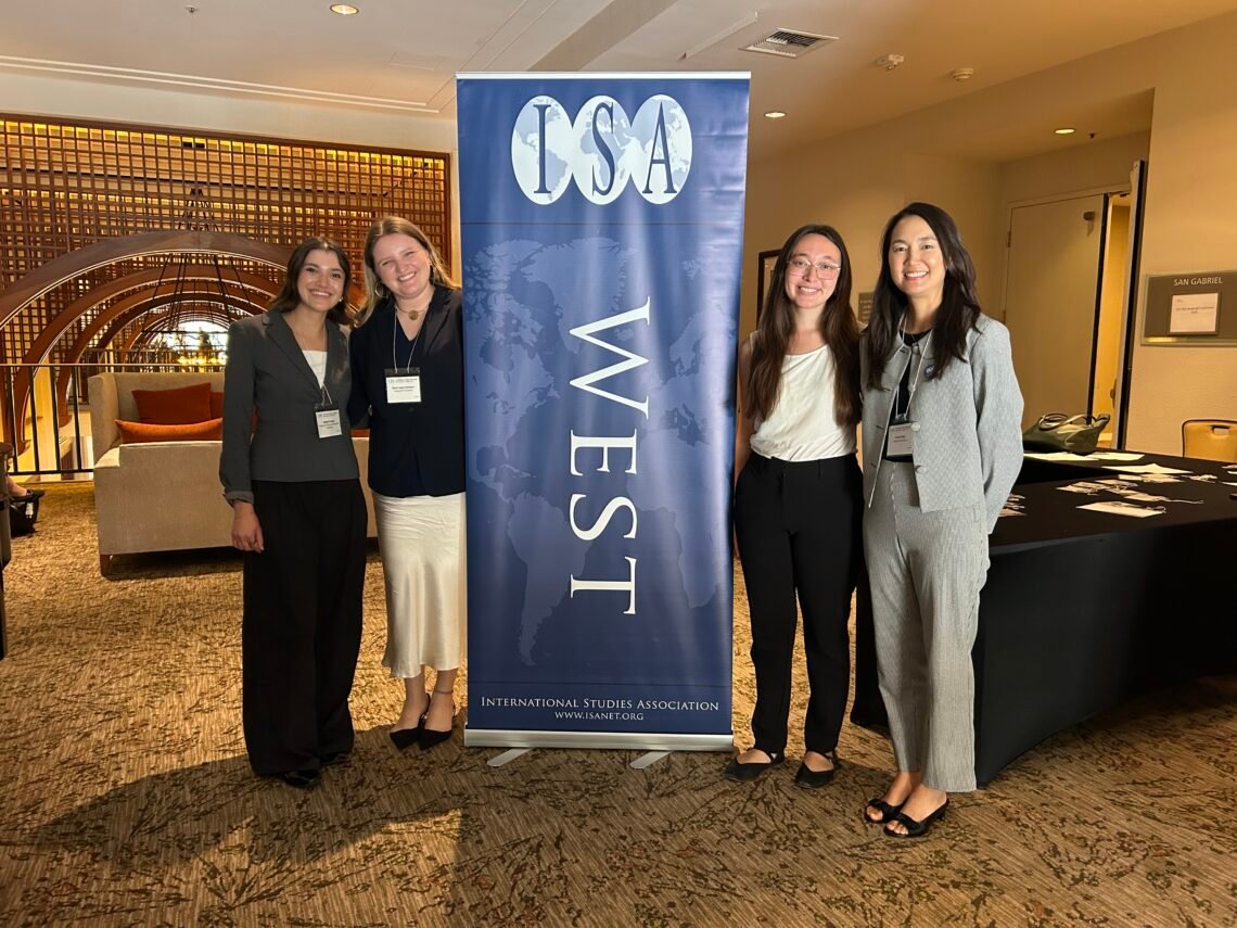 Students with the ISA West banner.